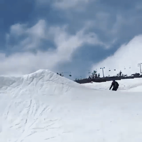 Skier And Snowboarder Collide